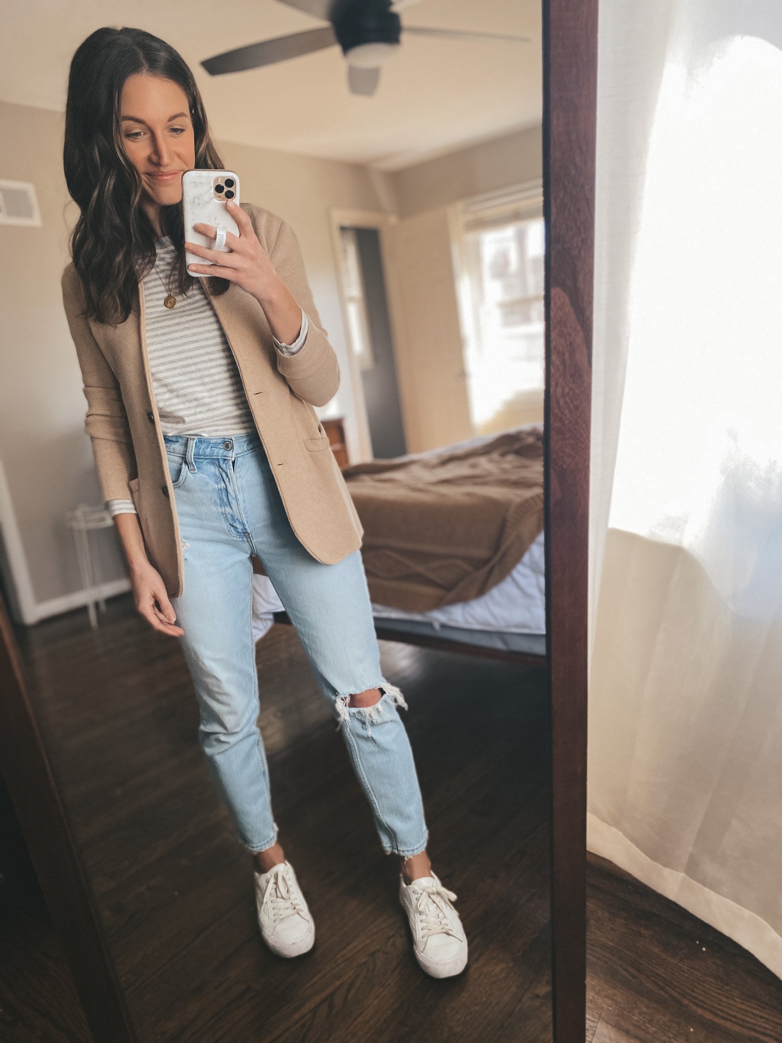 ashley wearing a striped tee from Loft, a tan sweater blazer from J.Crew Factory, Abercrombie mom jeans and Madewell white sneakers