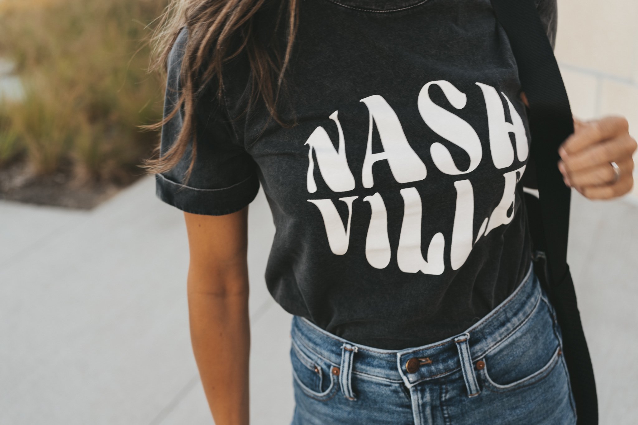 a close up picture of the black Nashville graphic tee from ABLE