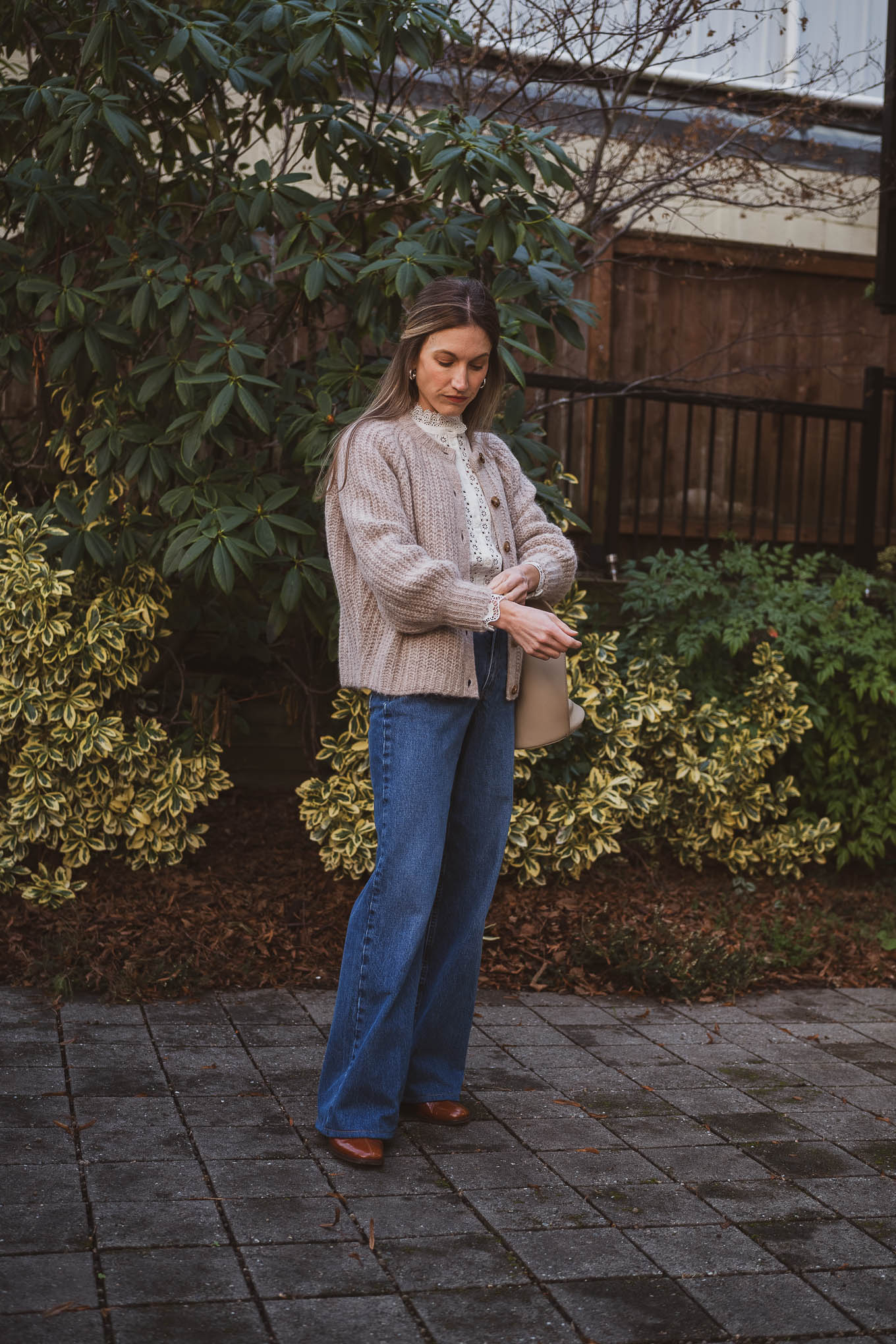 Sézane emilie cardigan review; ashley wearing the Rym Blouse, Emilie Cardigan, Wide Leg Trousers, Axelle Boots, and the Romie Bag