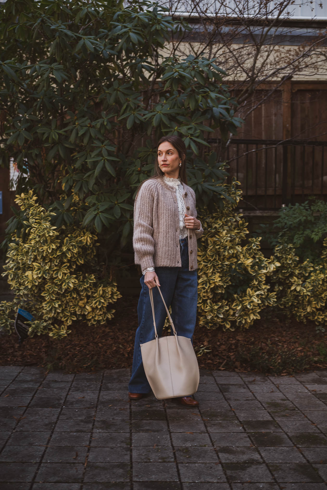 Sézane emilie cardigan review; ashley wearing the Rym Blouse, Emilie Cardigan, Wide Leg Trousers, Axelle Boots, and the Romie Bag